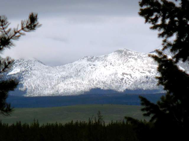 snow-covered mountain range viewed from Yellowstone National Park